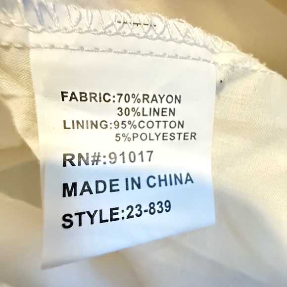 Solitaire Cream Long Sleeve Dress with Floral Details - Picture 9 of 10